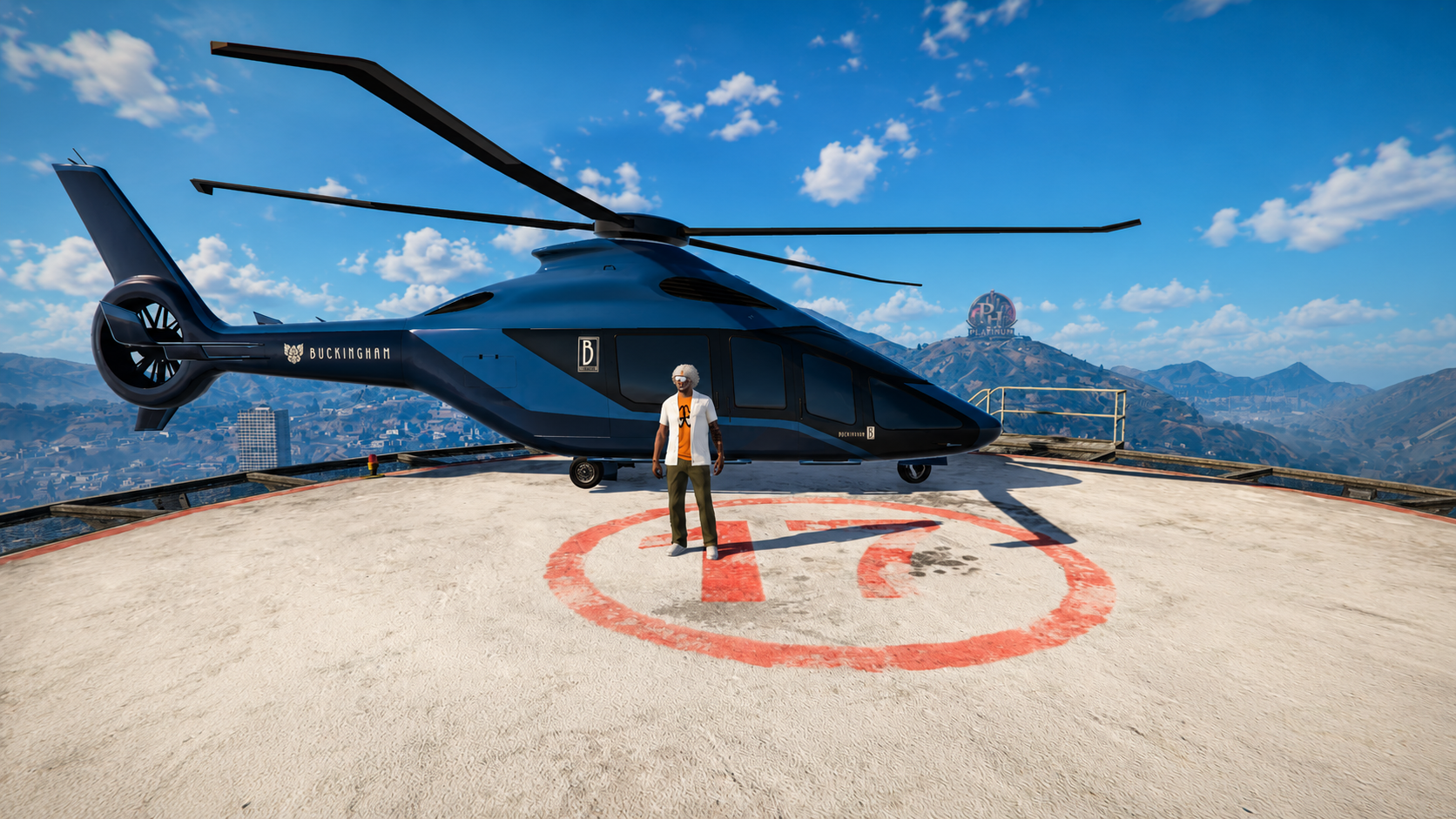 Buckingham helicopter on helipad with Platinum Heights Vinewood sign